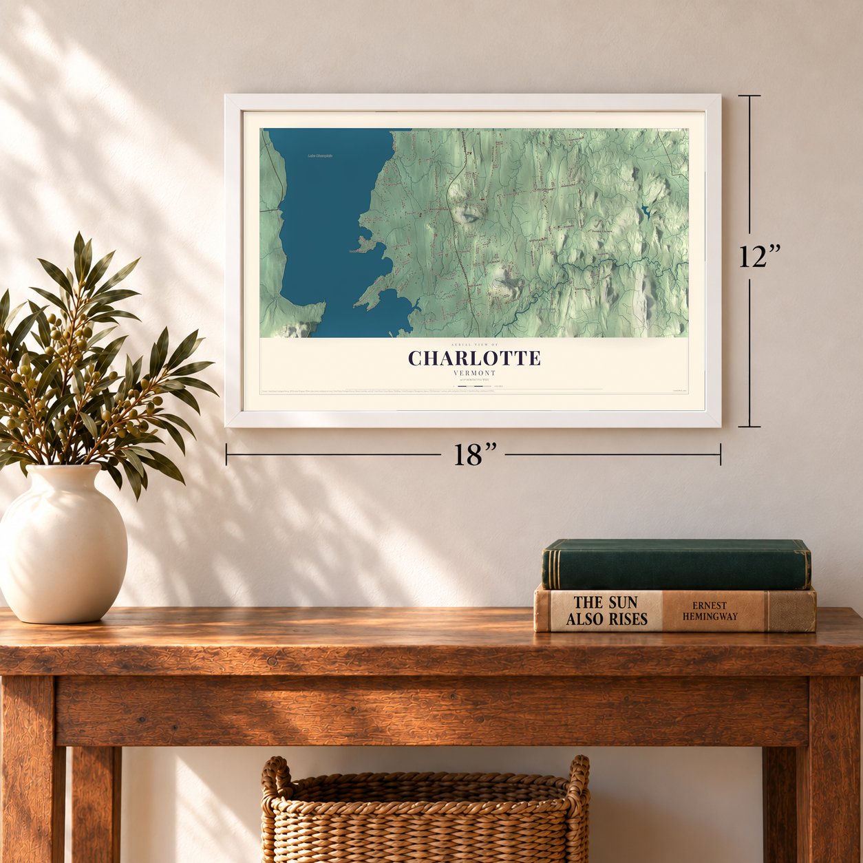 Charlotte, Vermont map, 12 x 18 inch print in a white frame in an entryway