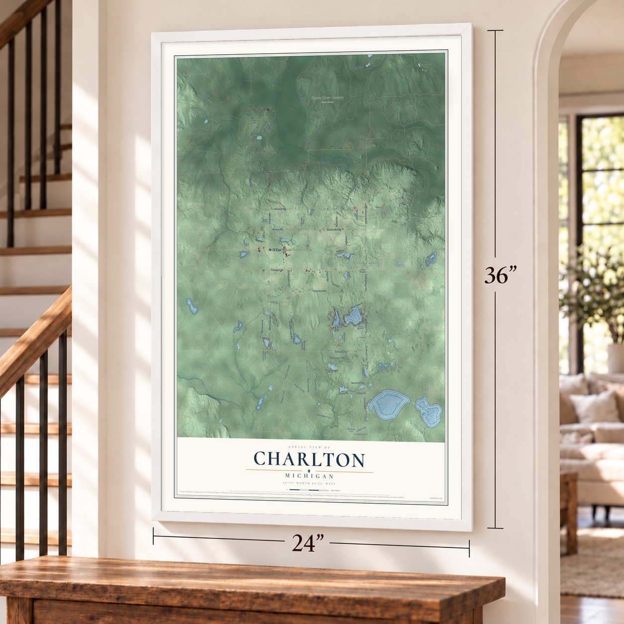 Charlton, Michigan map, 24 x 36 inch print in a white frame by a staircase