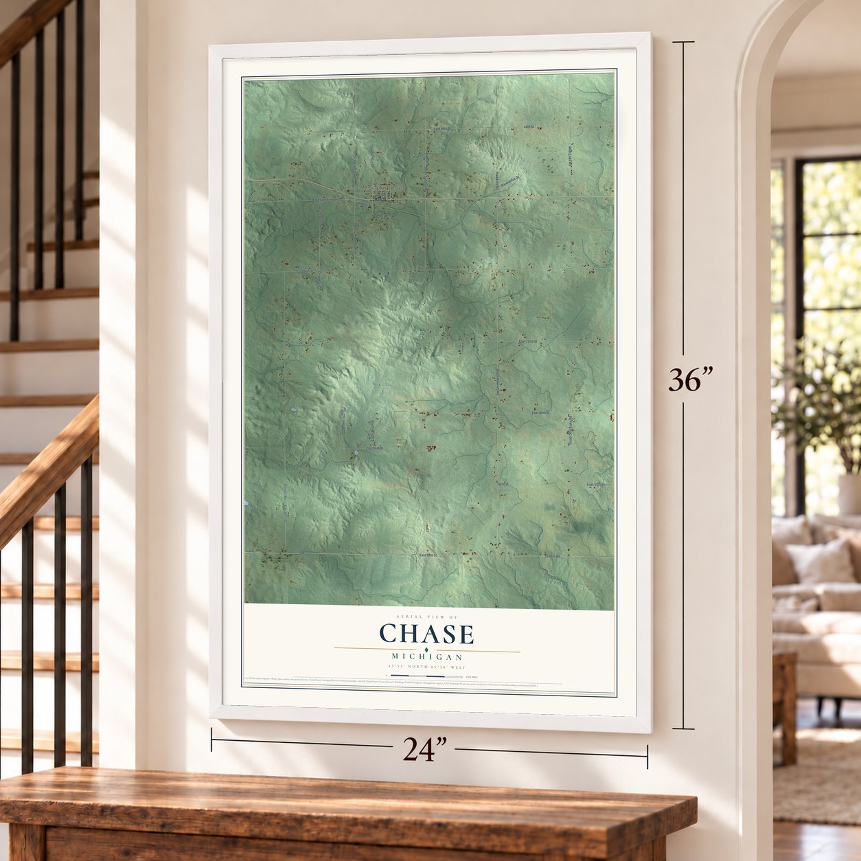 Chase, Michigan map, 24 x 36 inch print in a white frame by a staircase