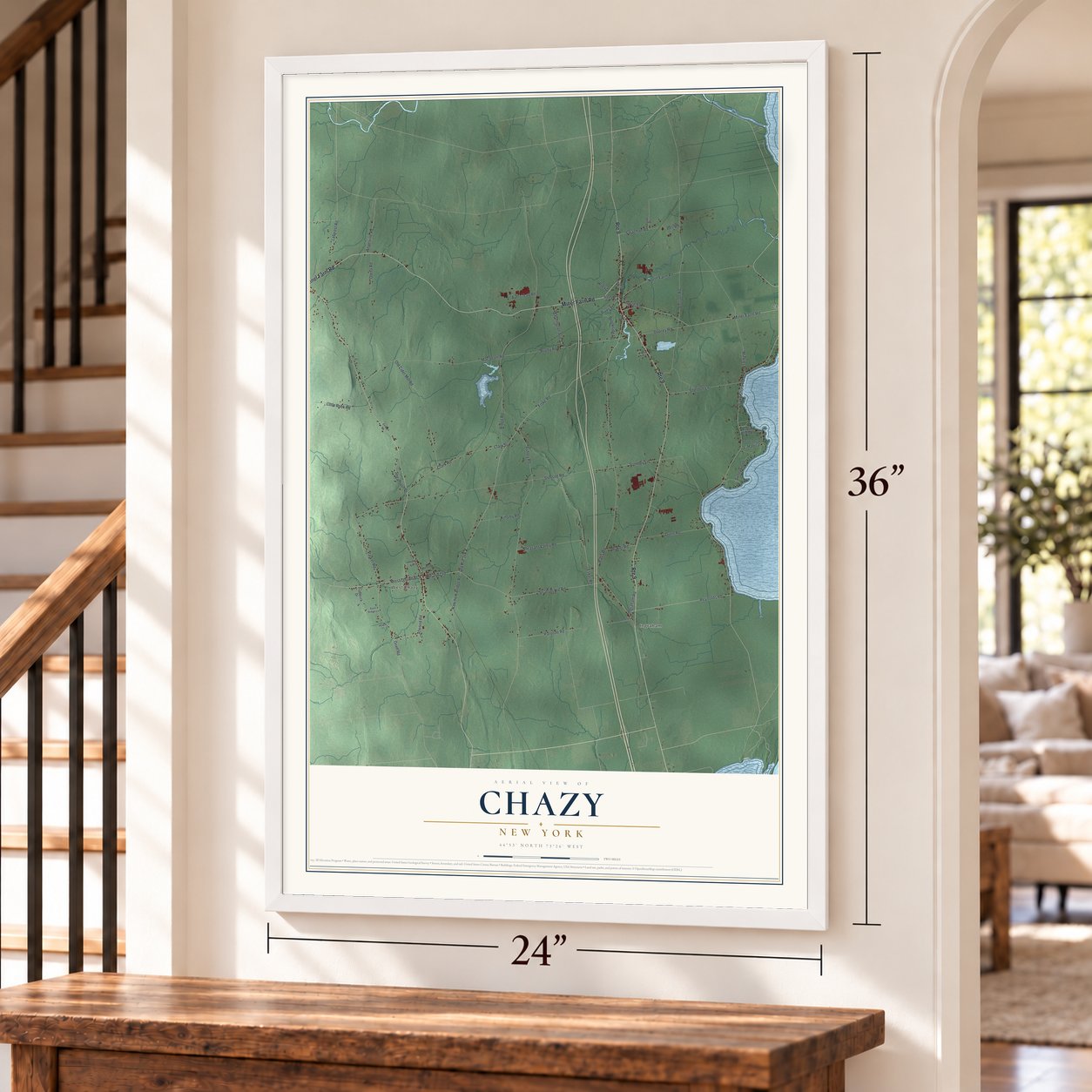Chazy, New York map, 24 x 36 inch print in a white frame by a staircase