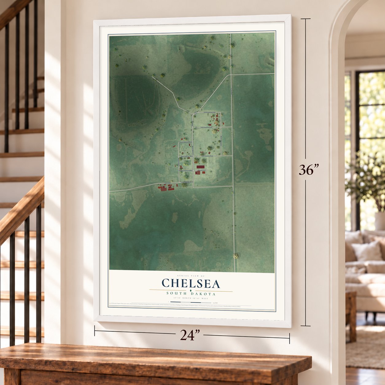 Chelsea, South Dakota map, 24 x 36 inch print in a white frame by a staircase
