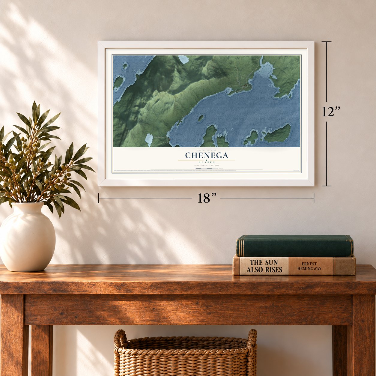 Chenega, Alaska map, 12 x 18 inch print in a white frame in an entryway