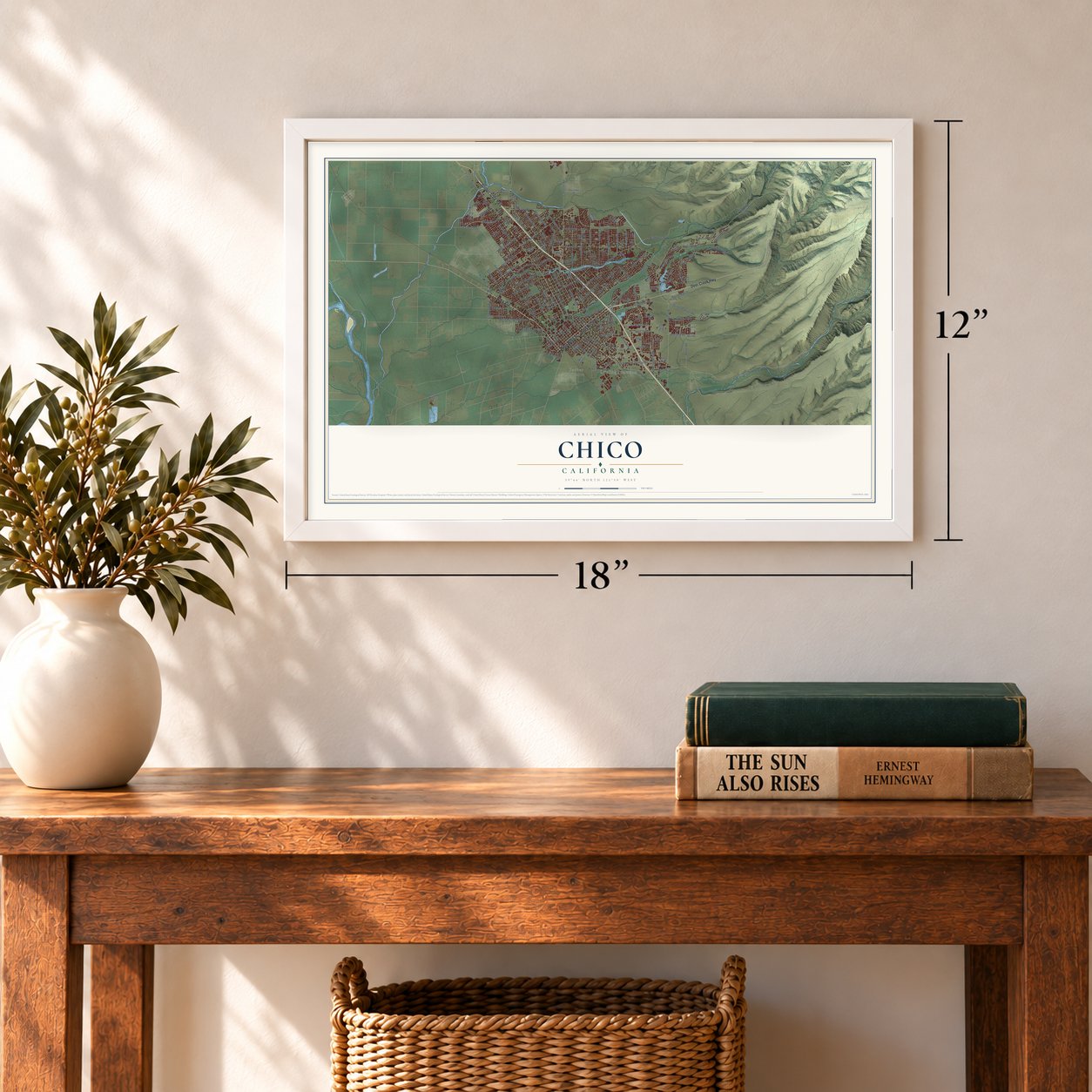 Chico, California map, 12 x 18 inch print in a white frame in an entryway