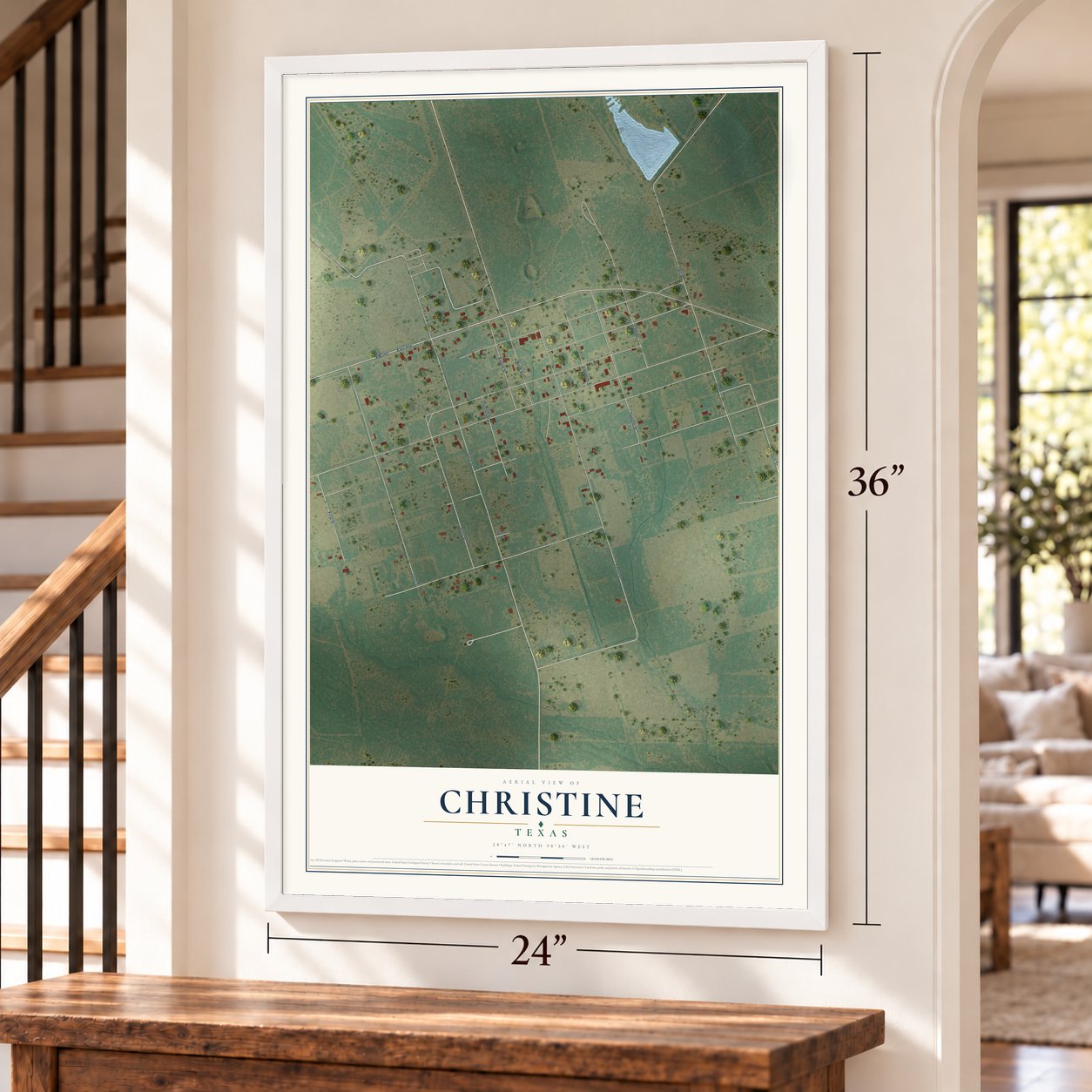 Christine, Texas map, 24 x 36 inch print in a white frame by a staircase