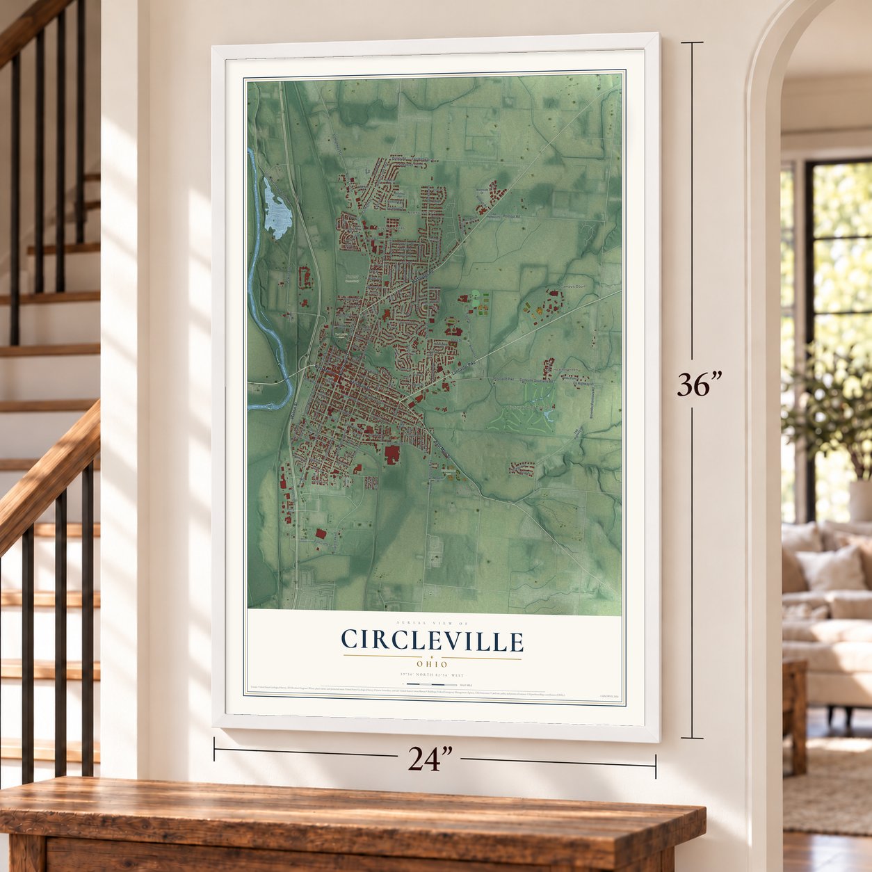 Circleville, Ohio map, 24 x 36 inch print in a white frame by a staircase