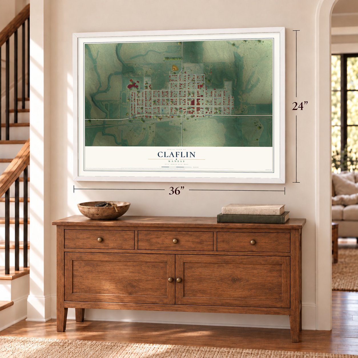 Claflin, Kansas map, 24 x 36 inch print in a white frame above a dresser by a staircase
