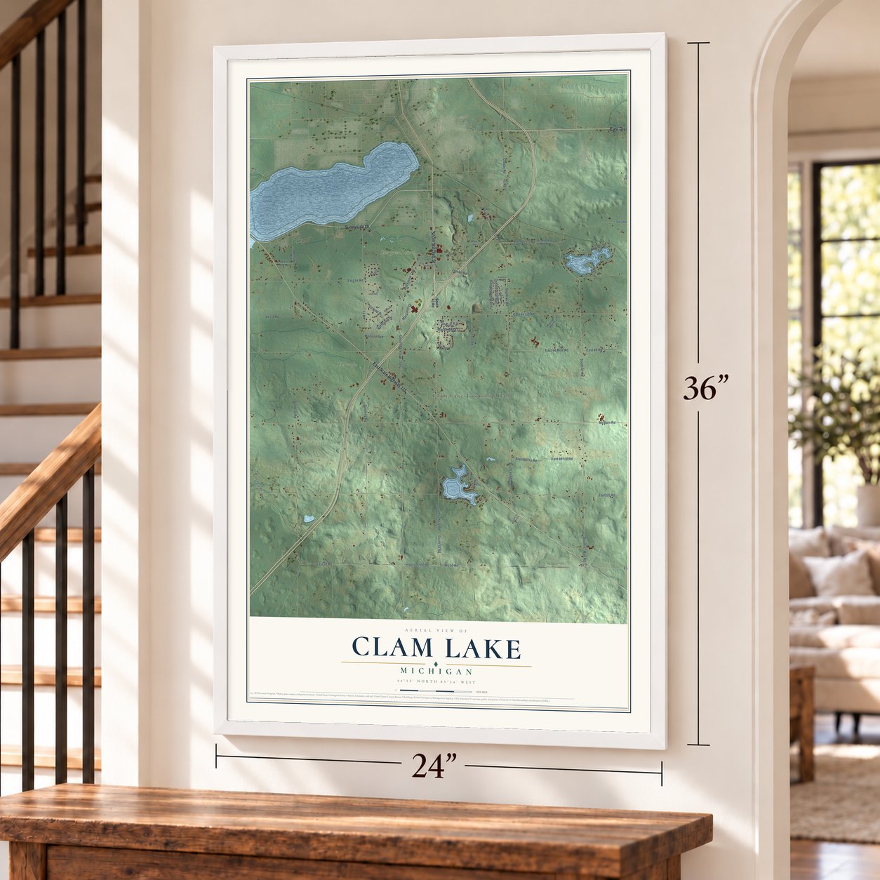 Clam Lake, Michigan map, 24 x 36 inch print in a white frame by a staircase