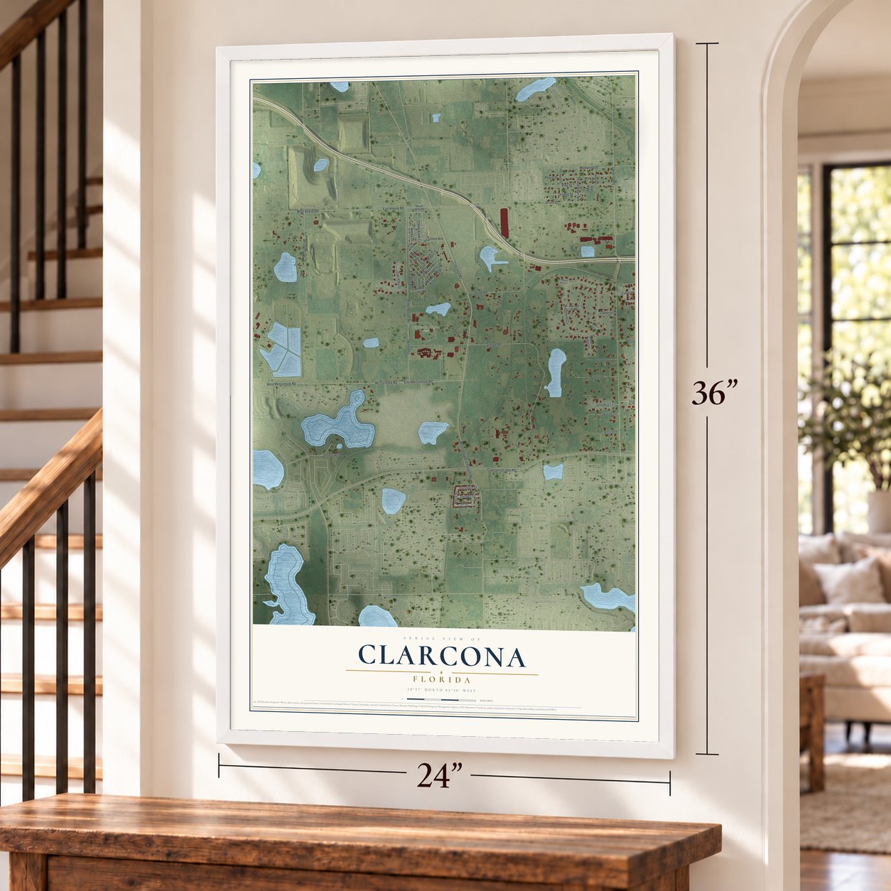 Clarcona, Florida map, 24 x 36 inch print in a white frame by a staircase