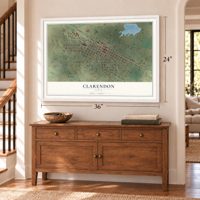 Clarendon, Texas map, 24 x 36 inch print in a white frame above a dresser by a staircase