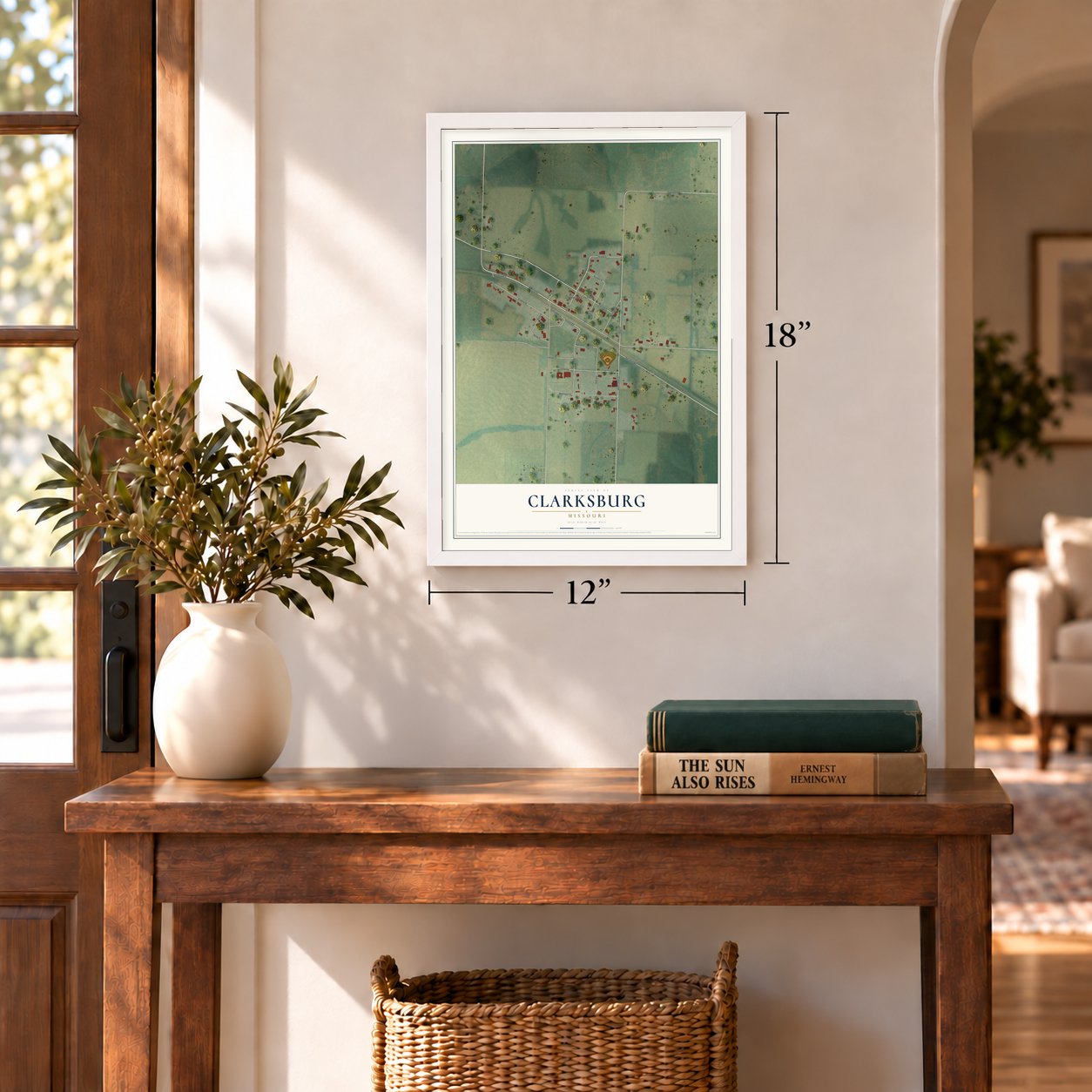 Clarksburg, Missouri map, 12 x 18 inch print in a white frame in an entryway