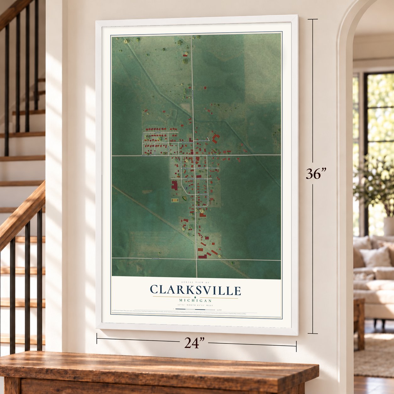 Clarksville, Michigan map, 24 x 36 inch print in a white frame by a staircase