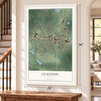 Claxton, Georgia map, 24 x 36 inch print in a white frame by a staircase