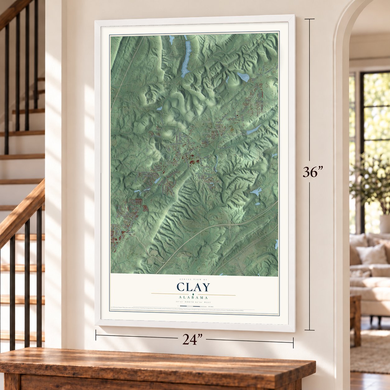 Clay, Alabama map, 24 x 36 inch print in a white frame by a staircase