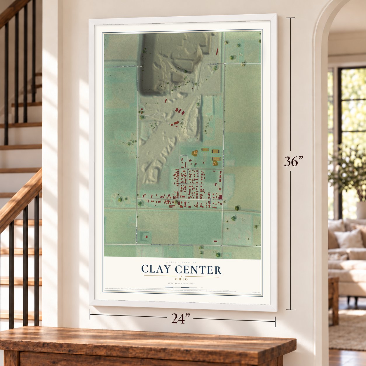 Clay Center, Ohio map, 24 x 36 inch print in a white frame by a staircase