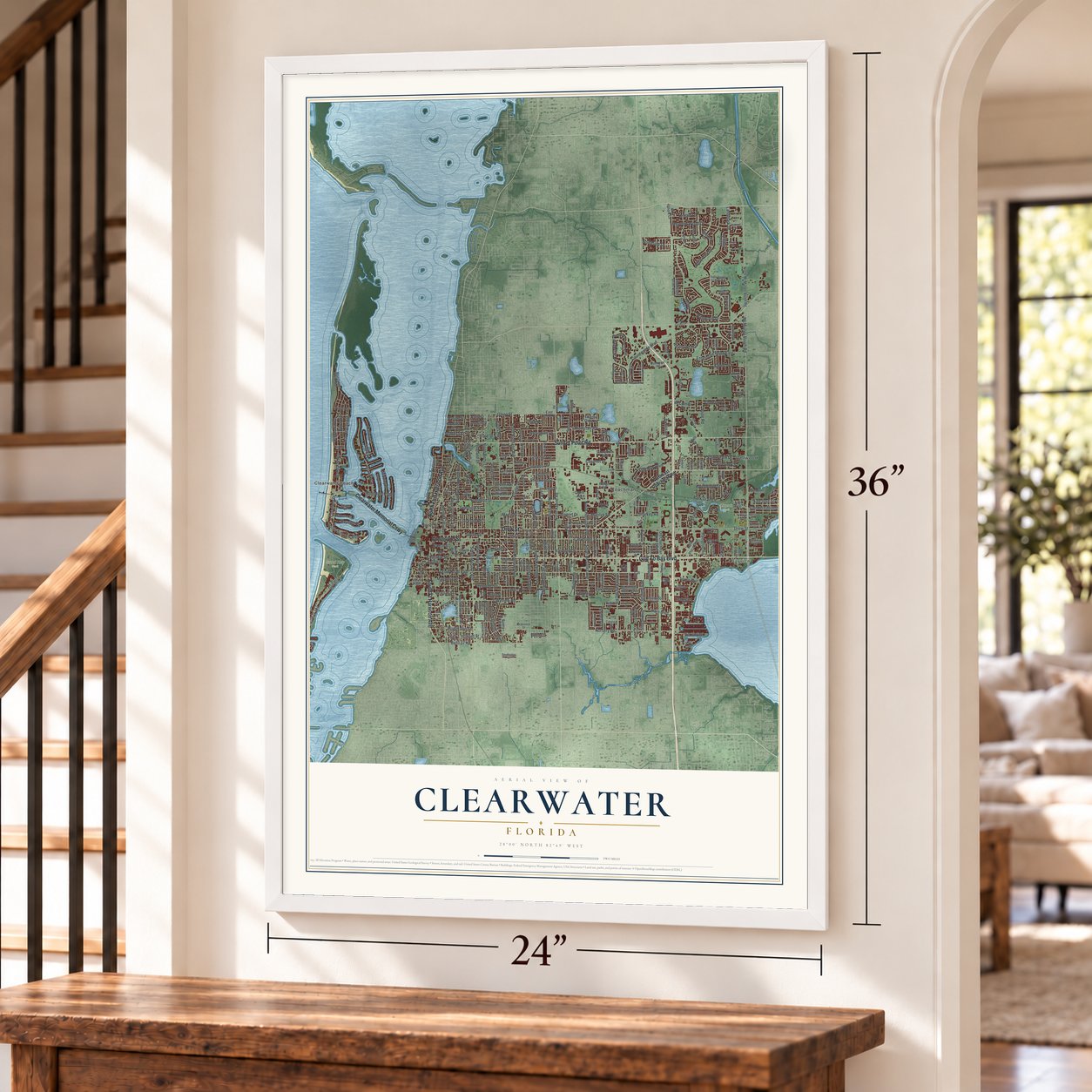 Clearwater, Florida map, 24 x 36 inch print in a white frame by a staircase