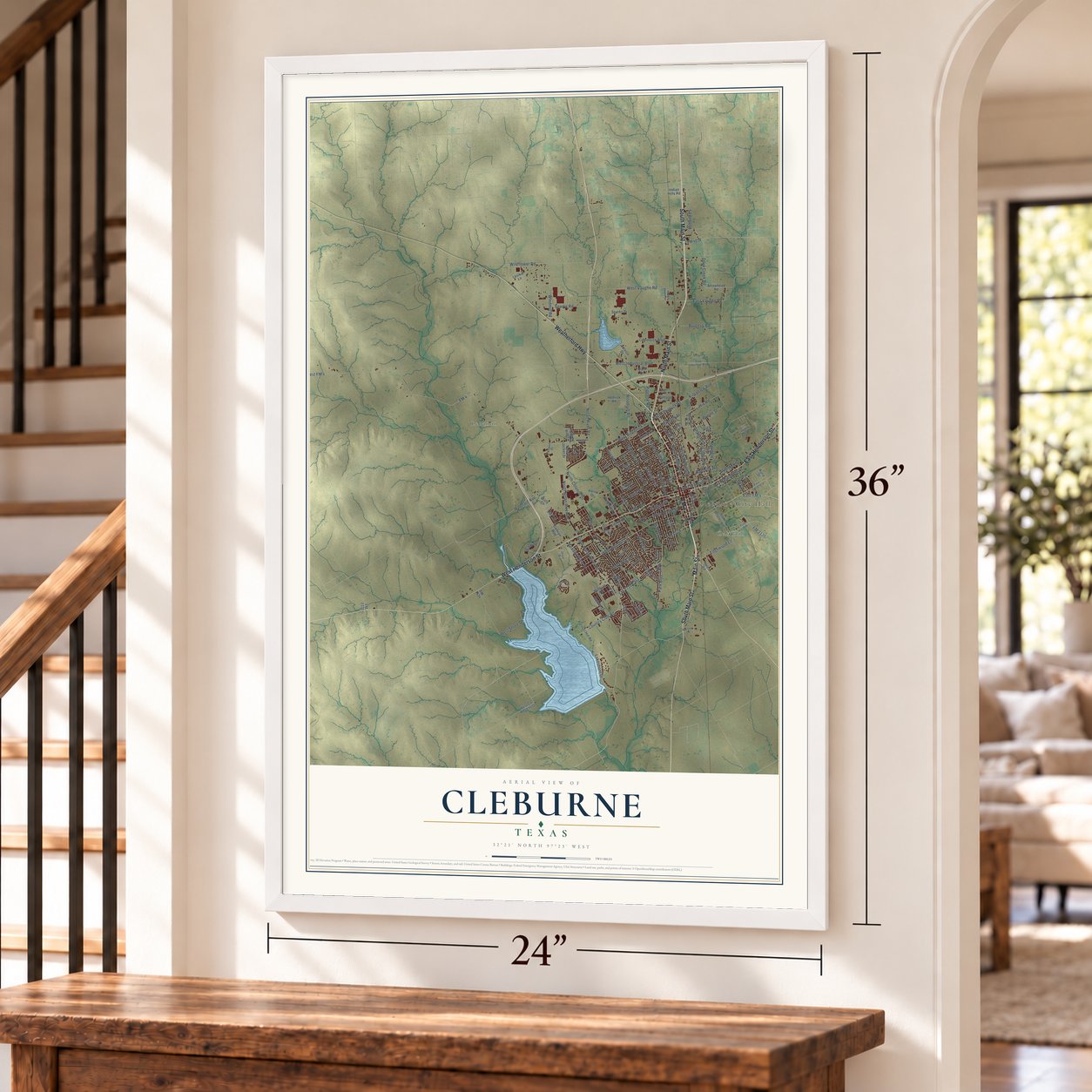 Cleburne, Texas map, 24 x 36 inch print in a white frame by a staircase
