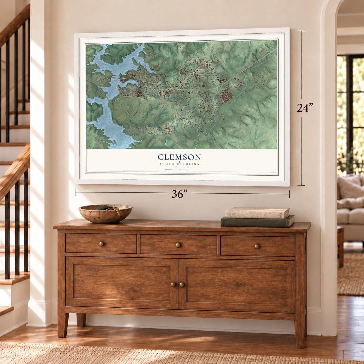 Clemson, South Carolina map, 24 x 36 inch print in a white frame above a dresser by a staircase