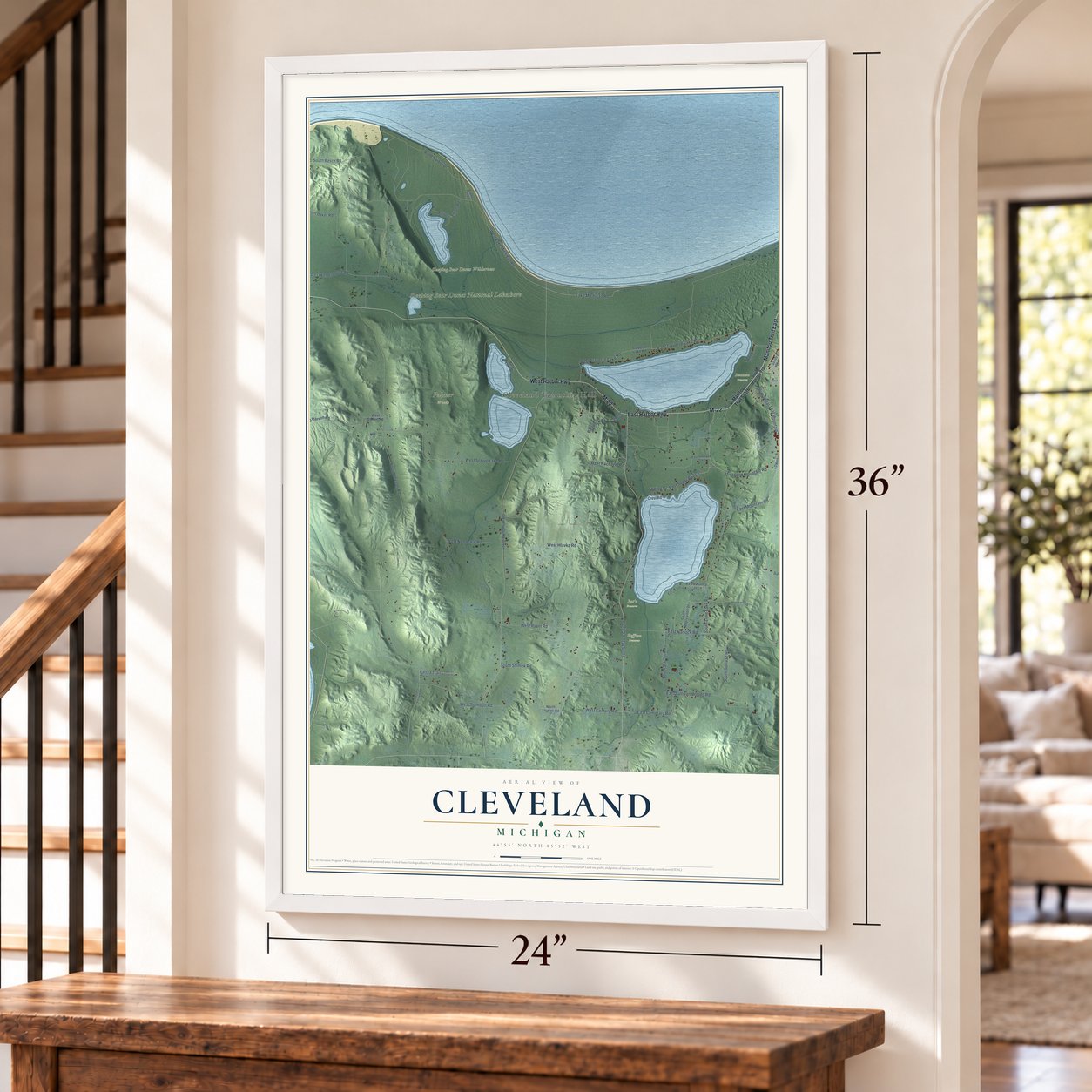 Cleveland, Michigan map, 24 x 36 inch print in a white frame by a staircase