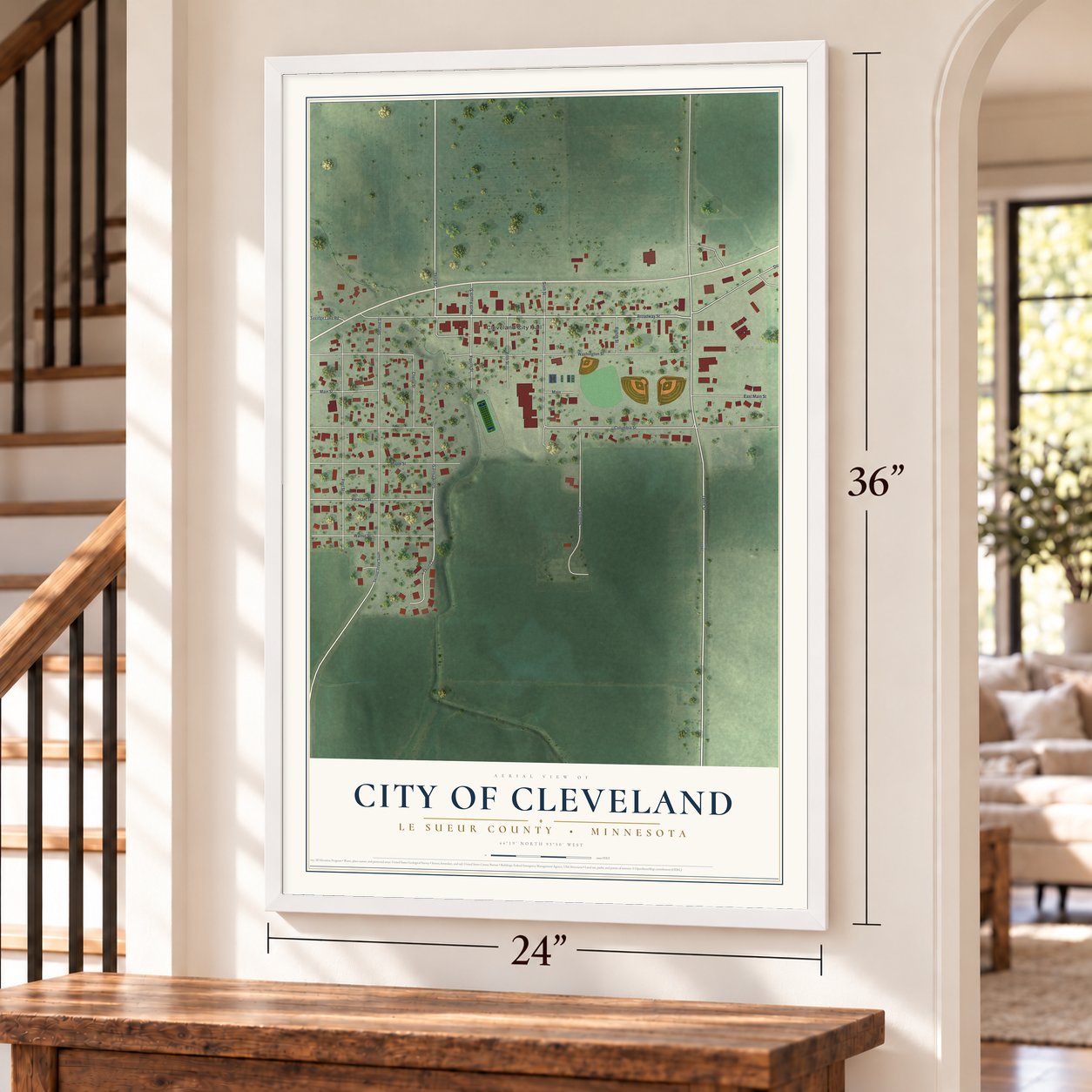 Cleveland, Minnesota map, 24 x 36 inch print in a white frame by a staircase