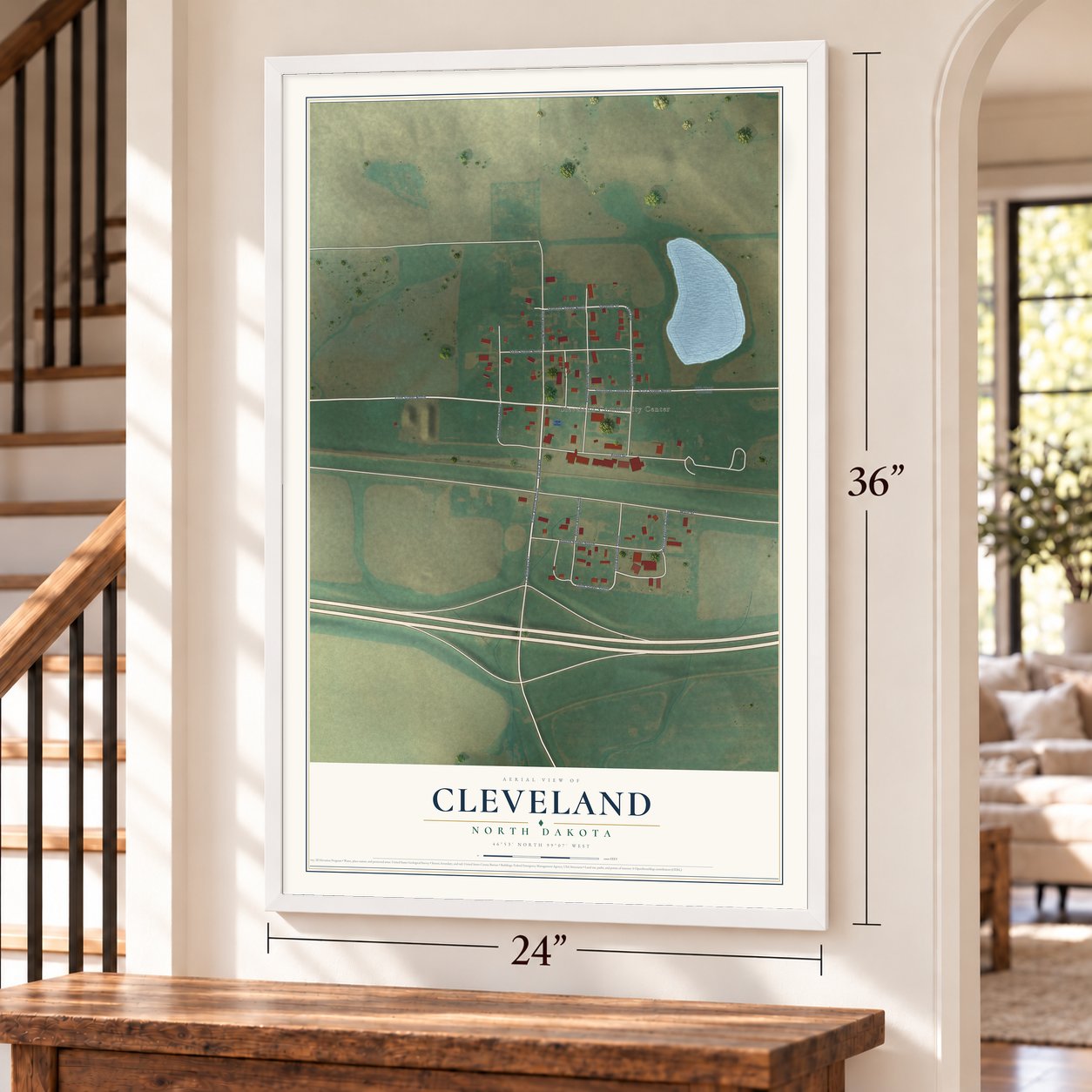 Cleveland, North Dakota map, 24 x 36 inch print in a white frame by a staircase
