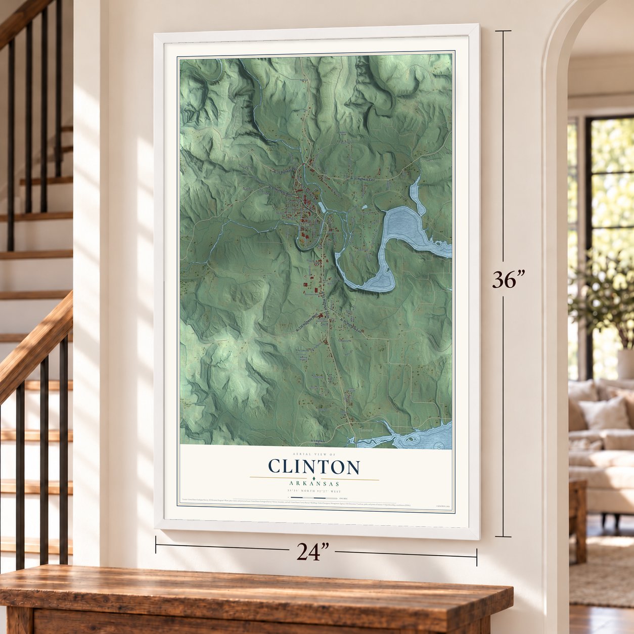 Clinton, Arkansas map, 24 x 36 inch print in a white frame by a staircase