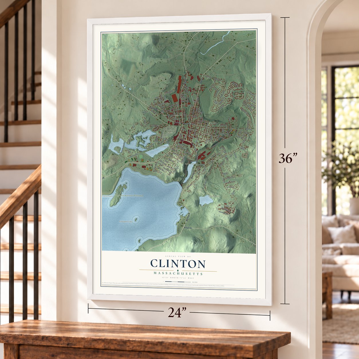 Clinton, Massachusetts map, 24 x 36 inch print in a white frame by a staircase