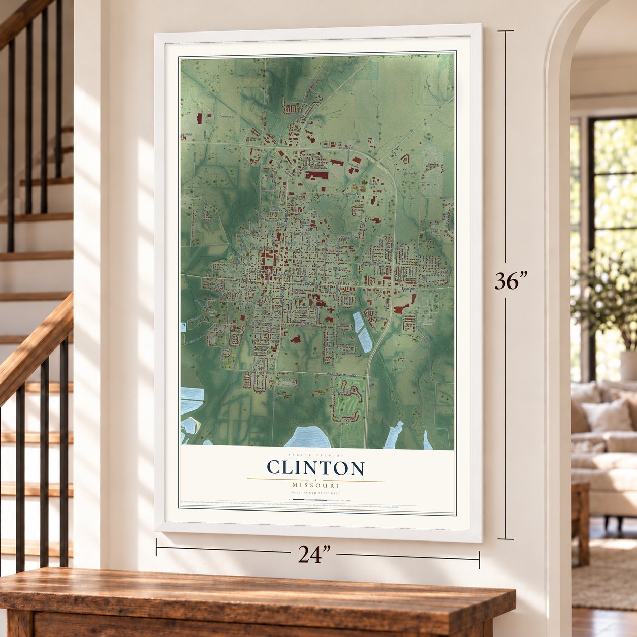 Clinton, Missouri map, 24 x 36 inch print in a white frame by a staircase