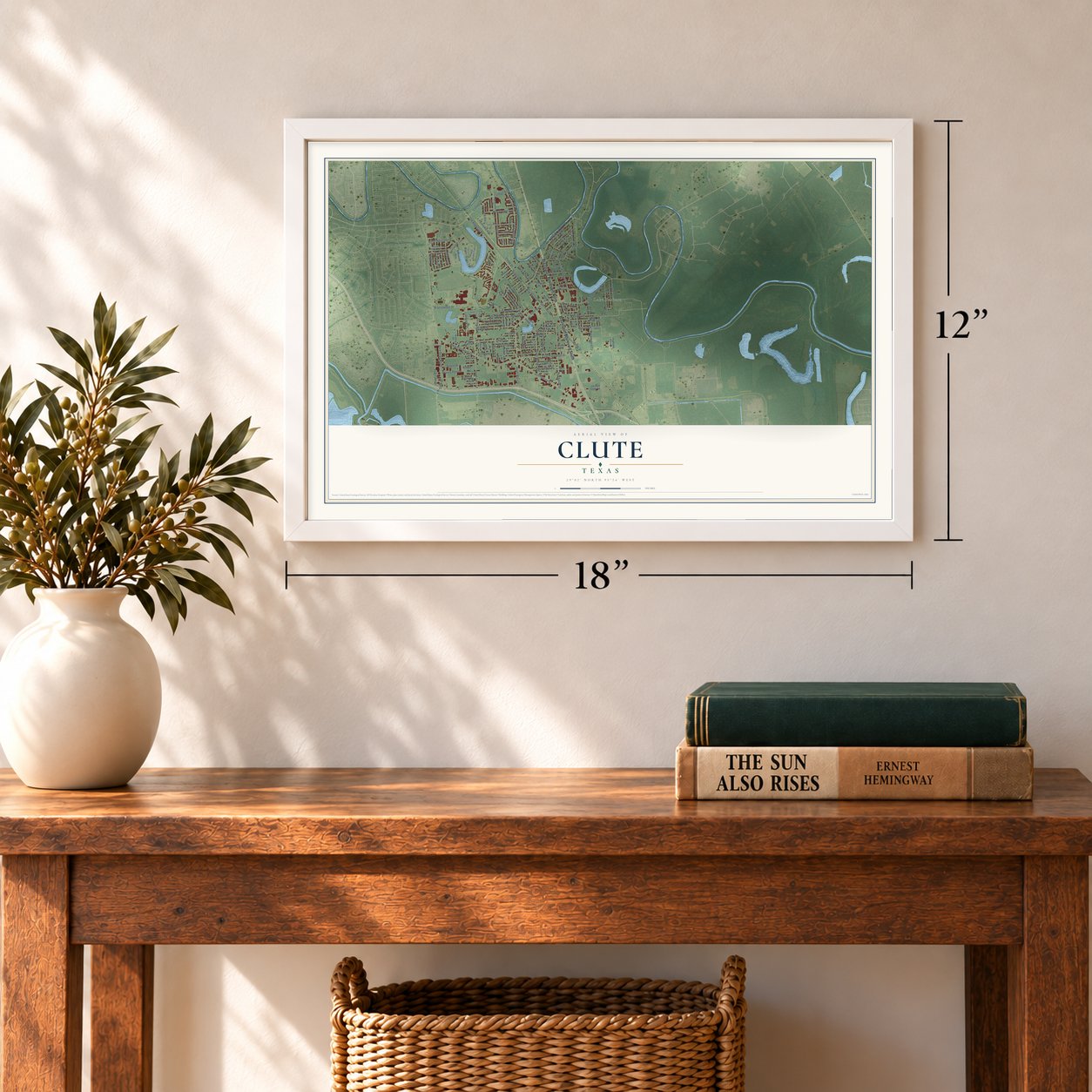 Clute, Texas map, 12 x 18 inch print in a white frame in an entryway