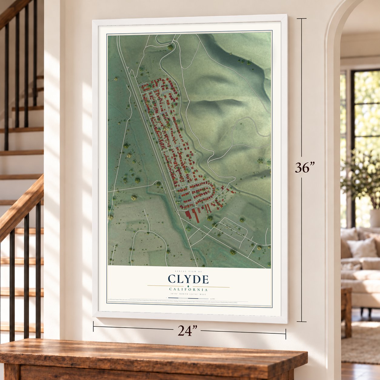 Clyde, California map, 24 x 36 inch print in a white frame by a staircase
