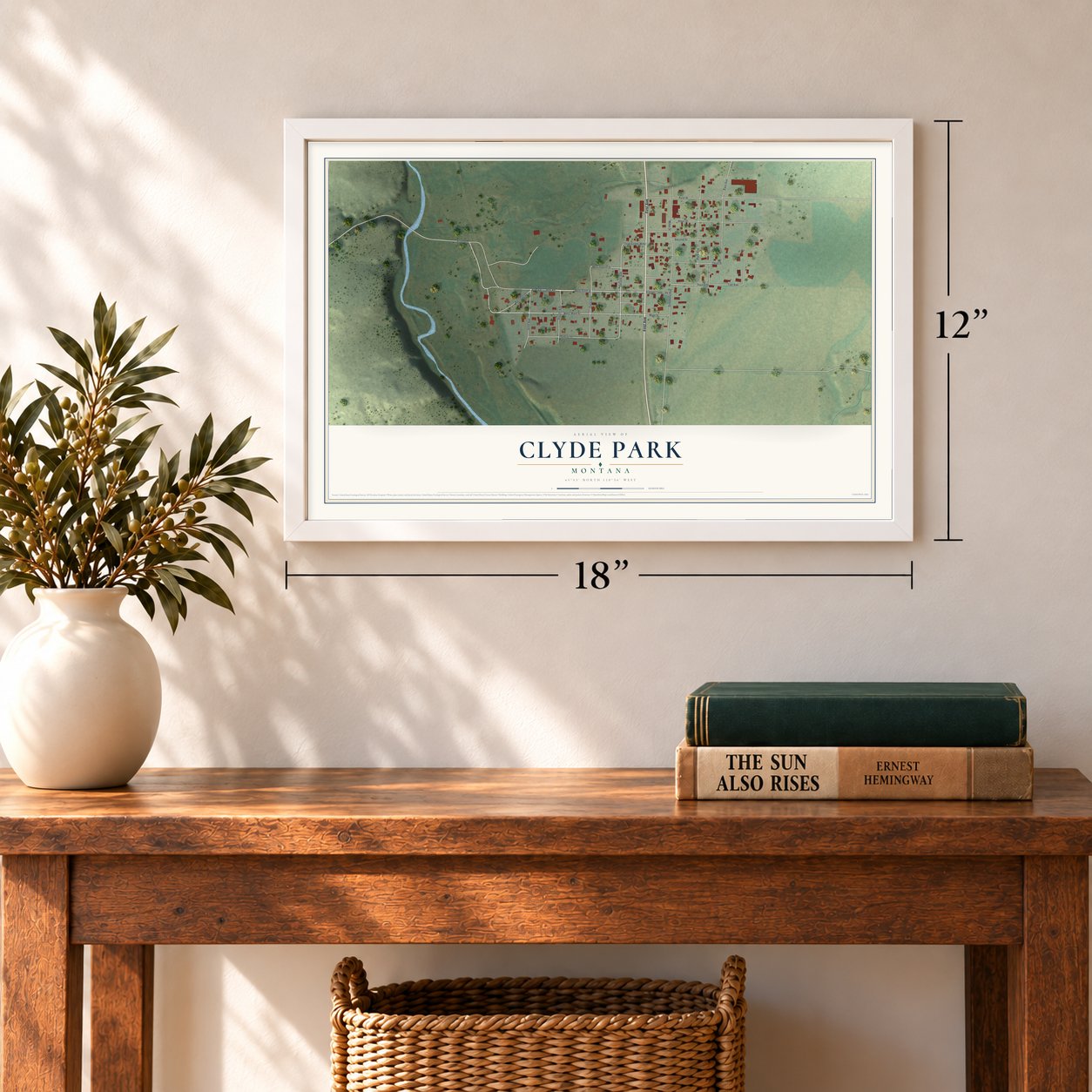 Clyde Park, Montana map, 12 x 18 inch print in a white frame in an entryway