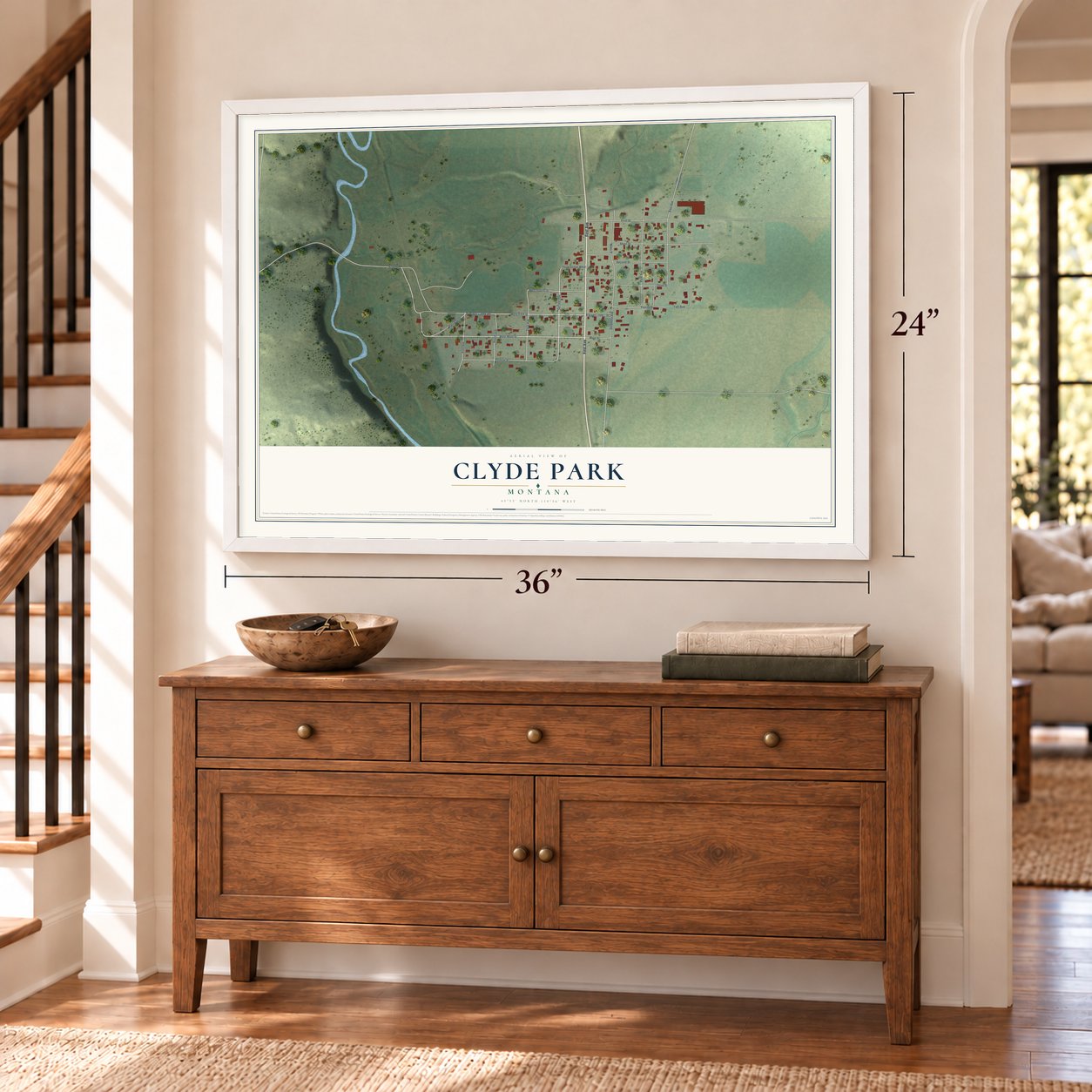 Clyde Park, Montana map, 24 x 36 inch print in a white frame above a dresser by a staircase