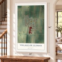 Clyman, Wisconsin map, 24 x 36 inch print in a white frame by a staircase