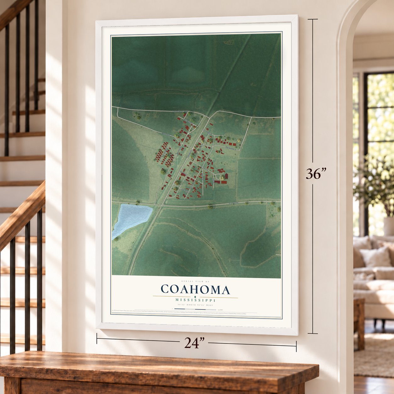 Coahoma, Mississippi map, 24 x 36 inch print in a white frame by a staircase