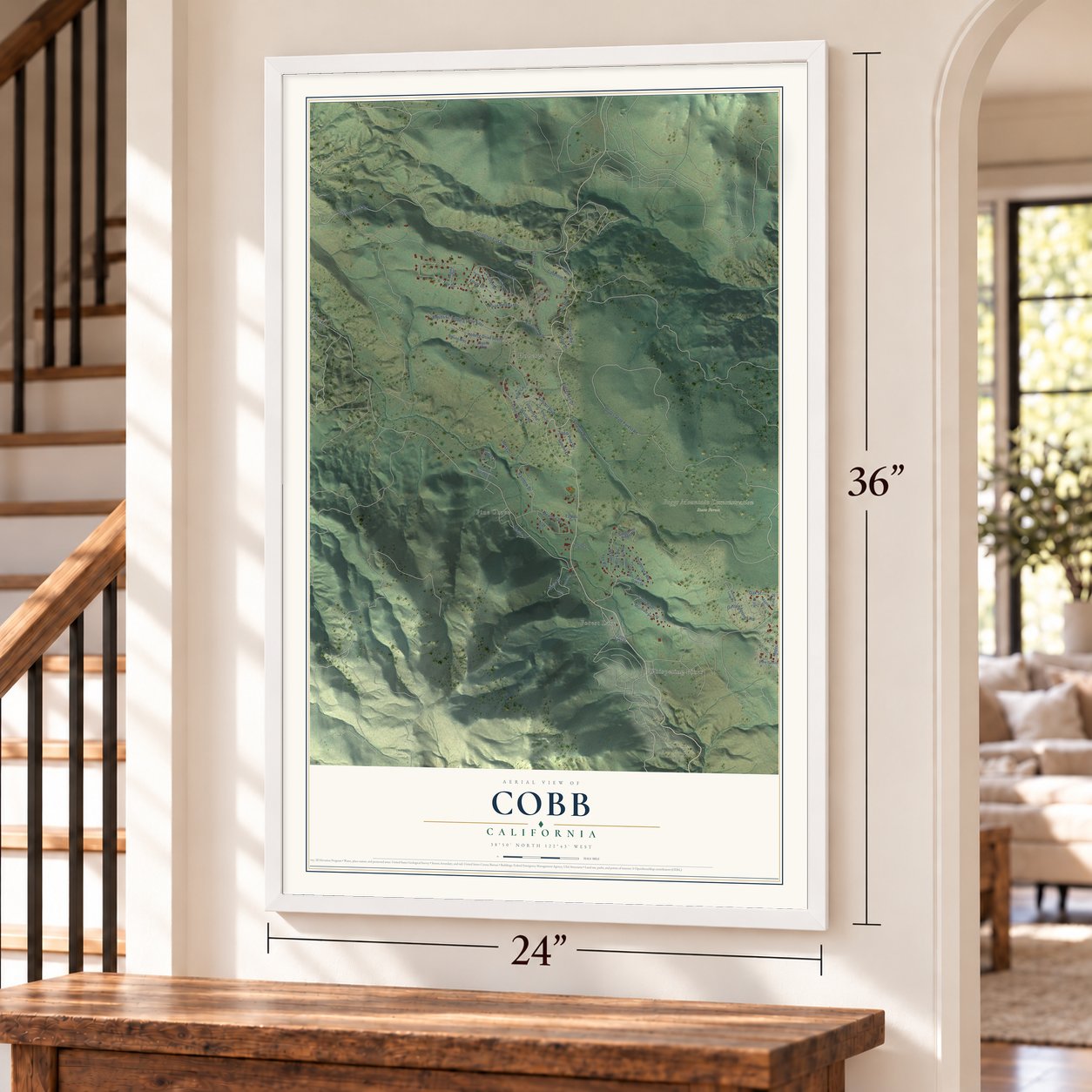 Cobb, California map, 24 x 36 inch print in a white frame by a staircase