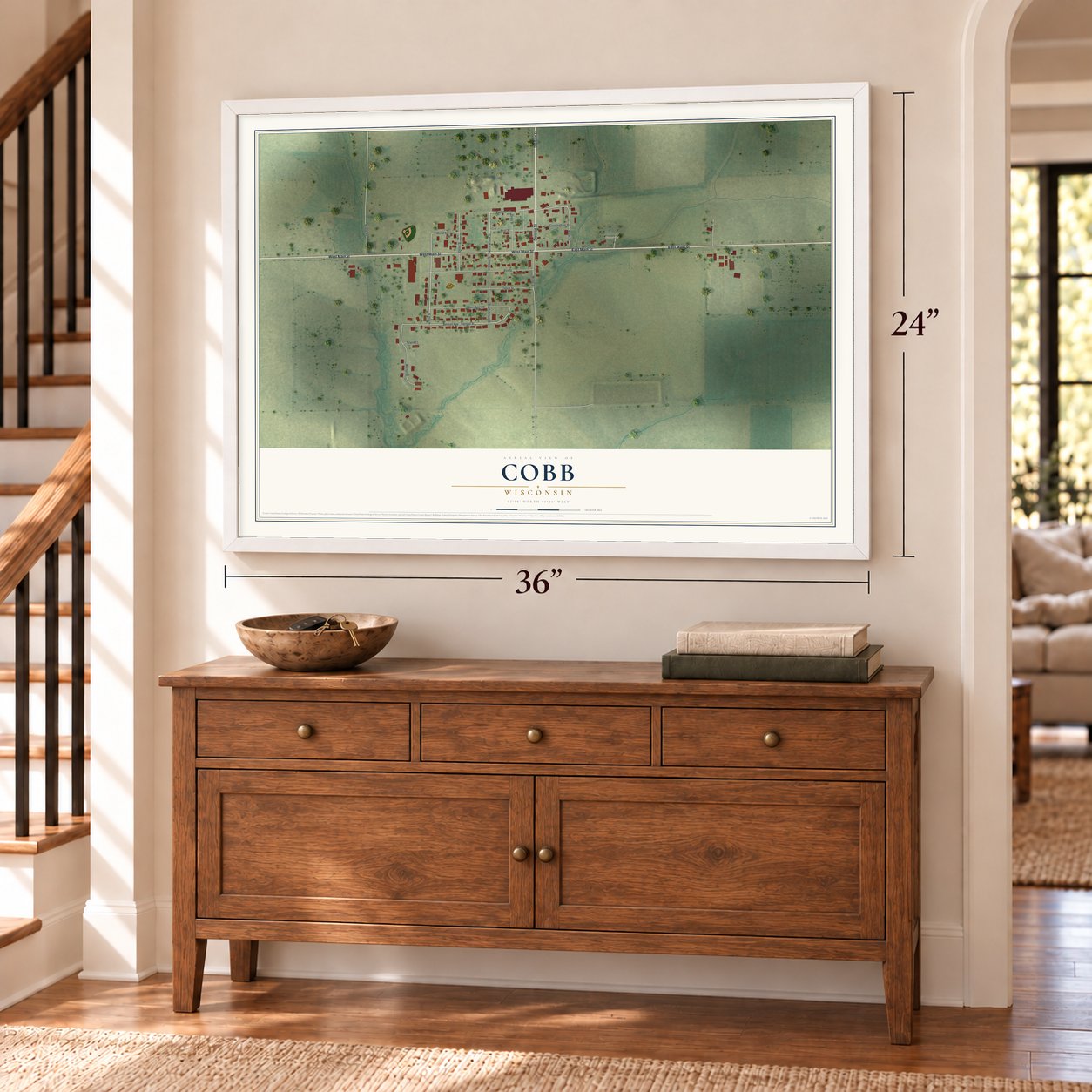 Cobb, Wisconsin map, 24 x 36 inch print in a white frame above a dresser by a staircase