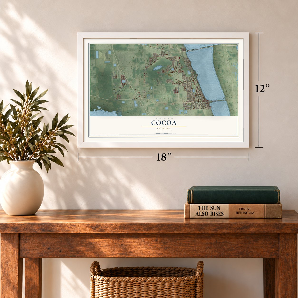 Cocoa, Florida map, 12 x 18 inch print in a white frame in an entryway