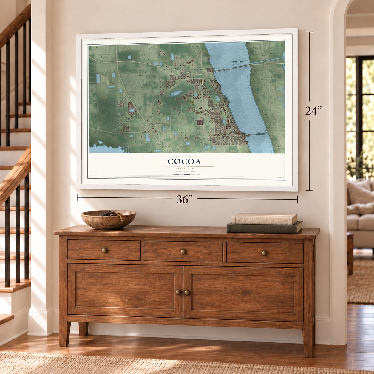 Cocoa, Florida map, 24 x 36 inch print in a white frame above a dresser by a staircase