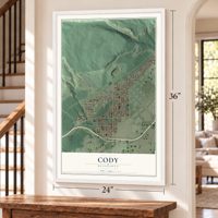 Cody, Minnesota map, 24 x 36 inch print in a white frame by a staircase