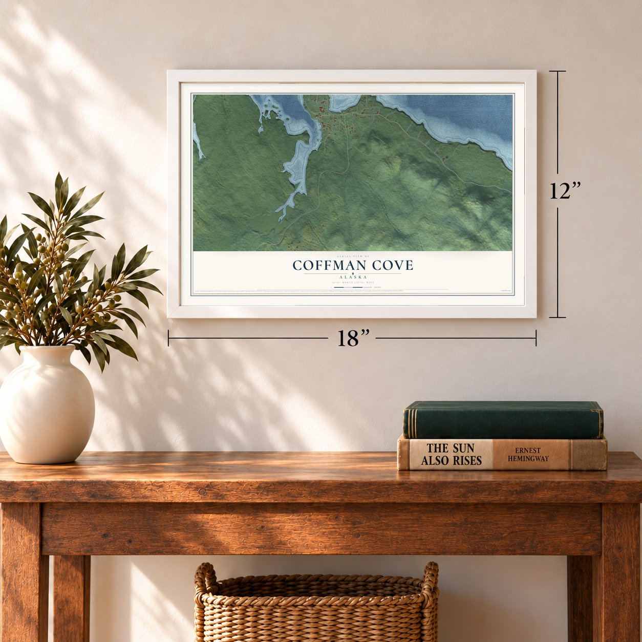 Coffman Cove, Alaska map, 12 x 18 inch print in a white frame in an entryway
