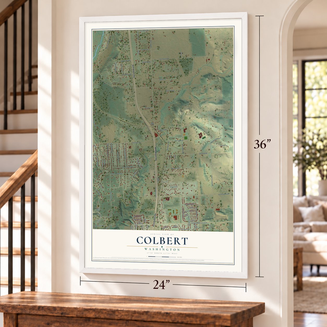 Colbert, Washington map, 24 x 36 inch print in a white frame by a staircase