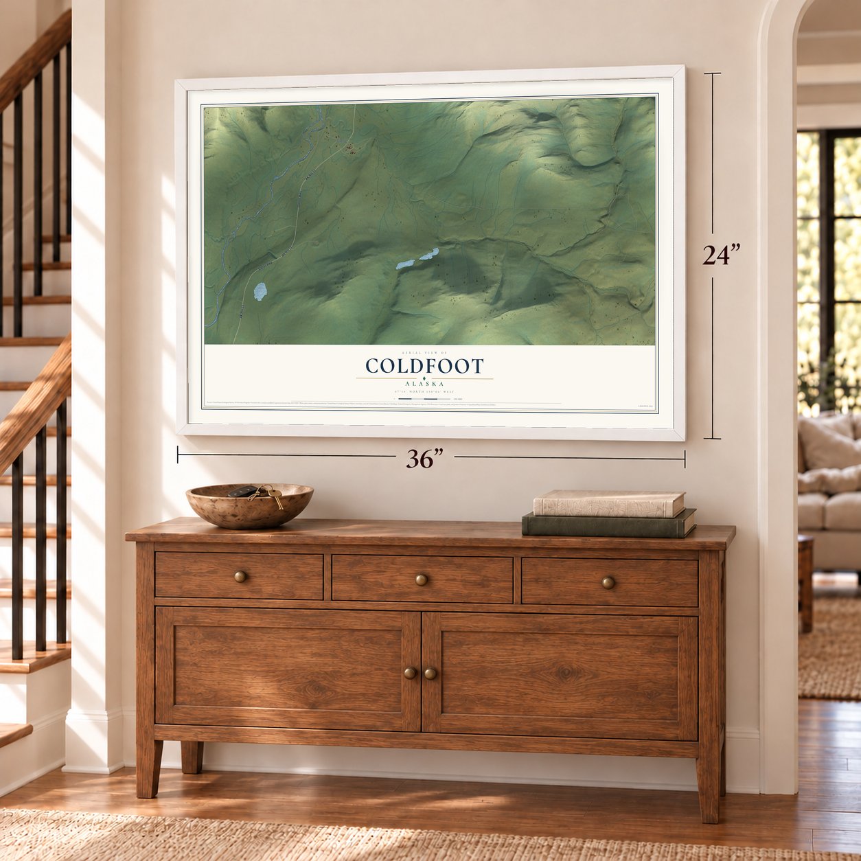 Coldfoot, Alaska map, 24 x 36 inch print in a white frame above a dresser by a staircase