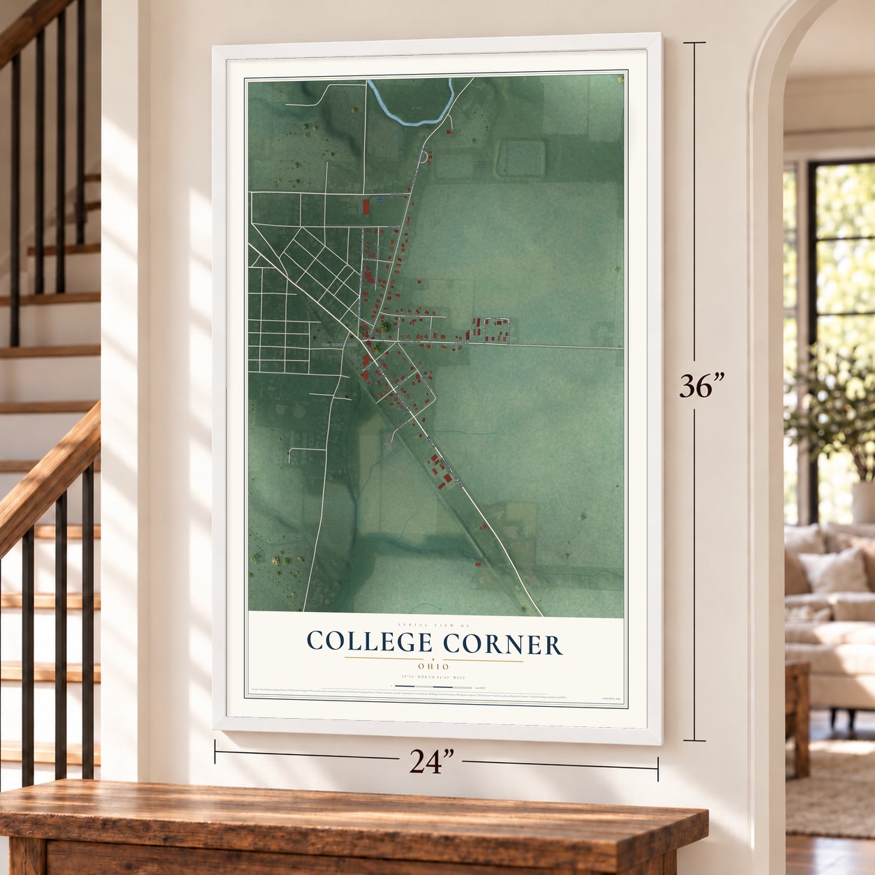College Corner, Ohio map, 24 x 36 inch print in a white frame by a staircase