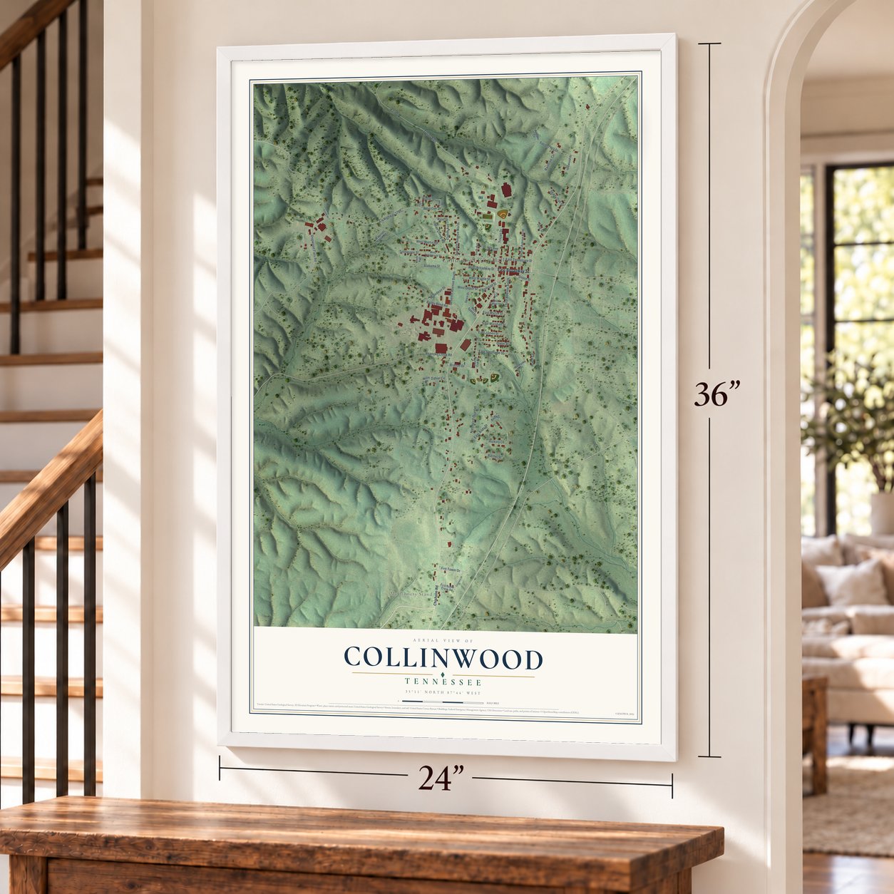 Collinwood, Tennessee map, 24 x 36 inch print in a white frame by a staircase