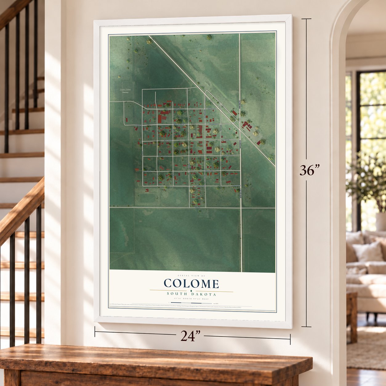 Colome, South Dakota map, 24 x 36 inch print in a white frame by a staircase