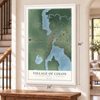 Colon, Michigan map, 24 x 36 inch print in a white frame by a staircase