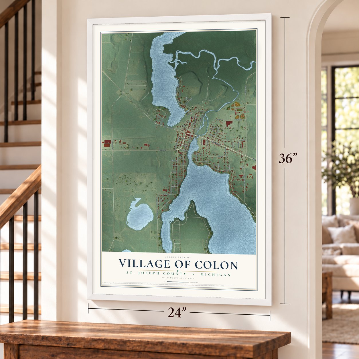 Colon, Michigan map, 24 x 36 inch print in a white frame by a staircase