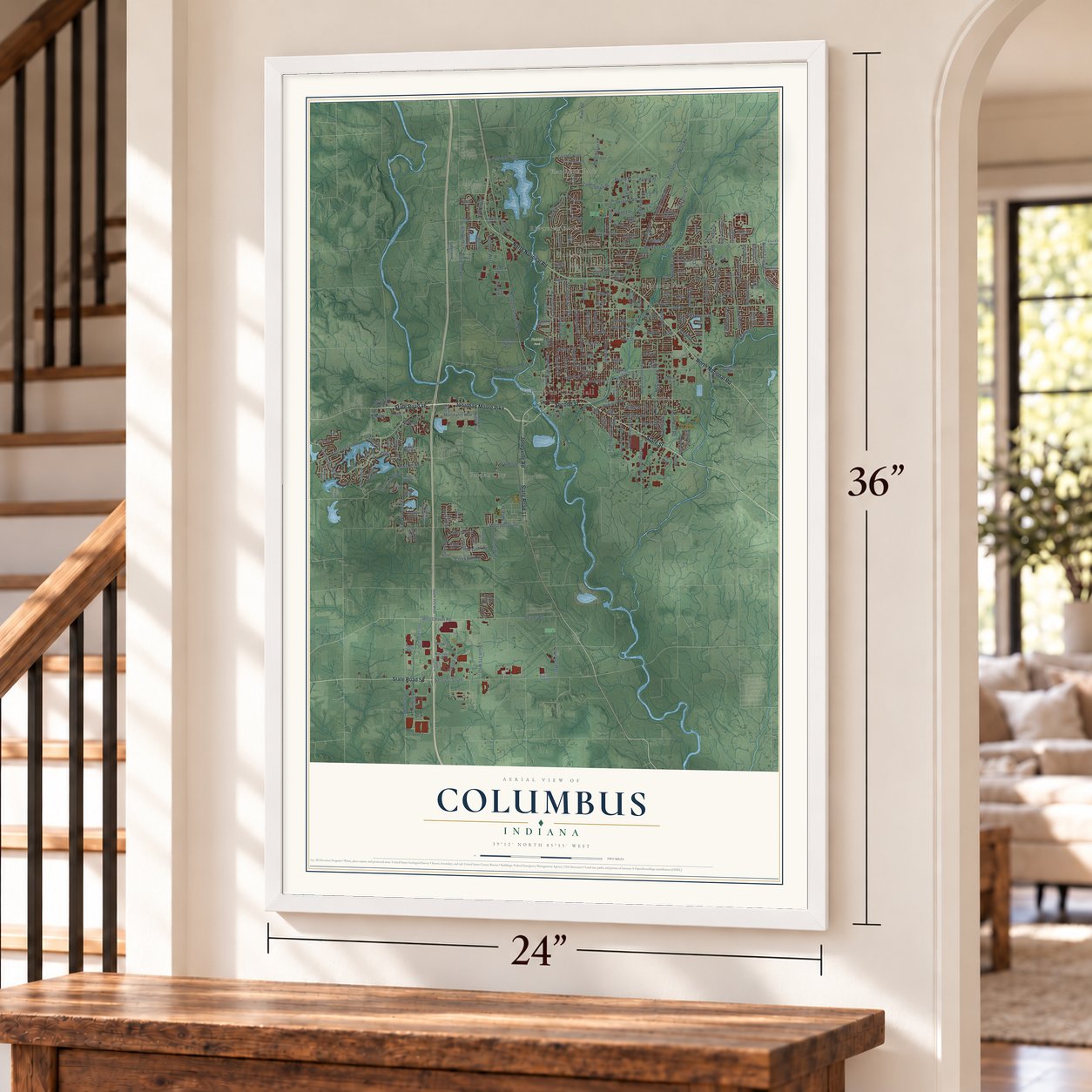Columbus, Indiana map, 24 x 36 inch print in a white frame by a staircase