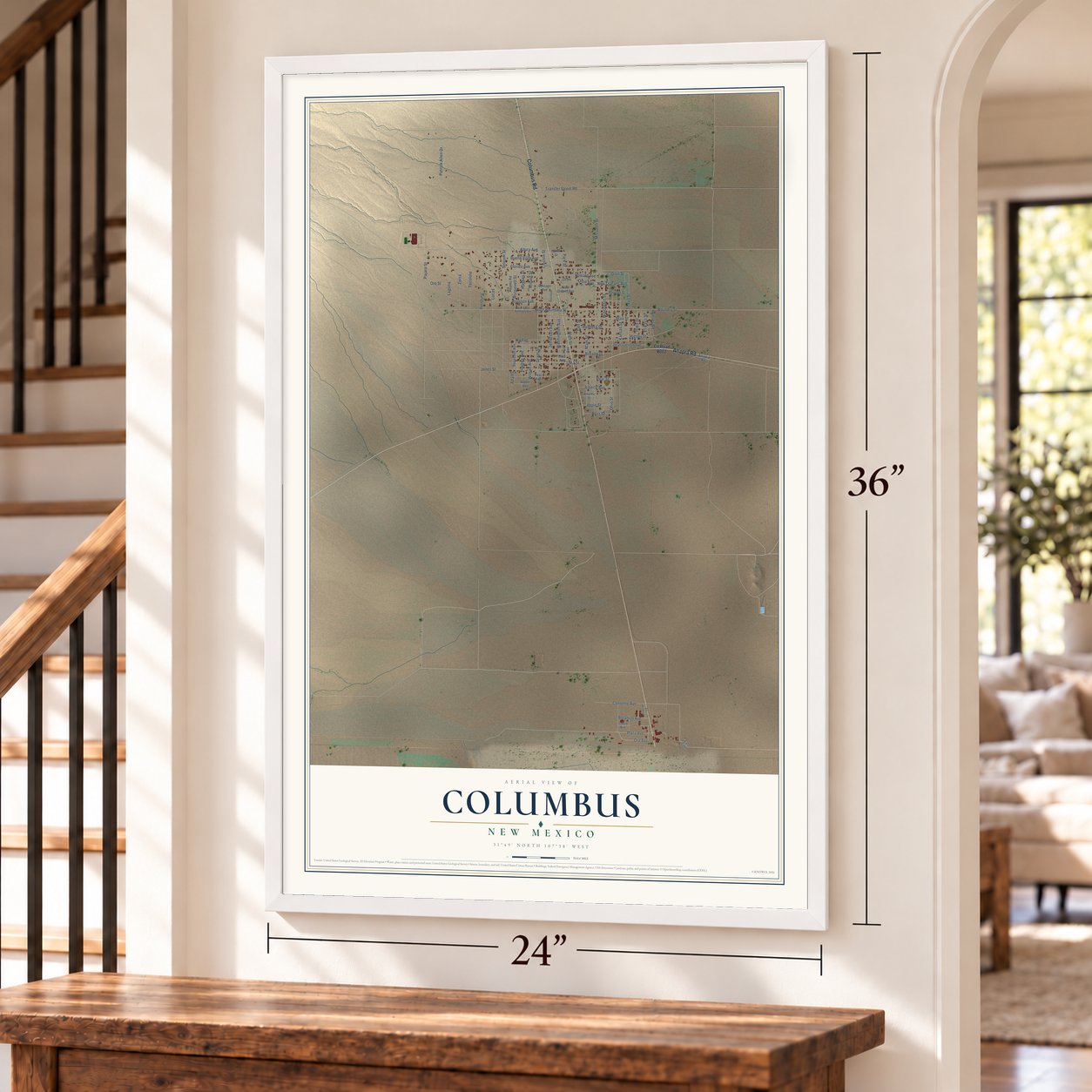Columbus, New Mexico map, 24 x 36 inch print in a white frame by a staircase