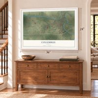 Columbus, Texas map, 24 x 36 inch print in a white frame above a dresser by a staircase