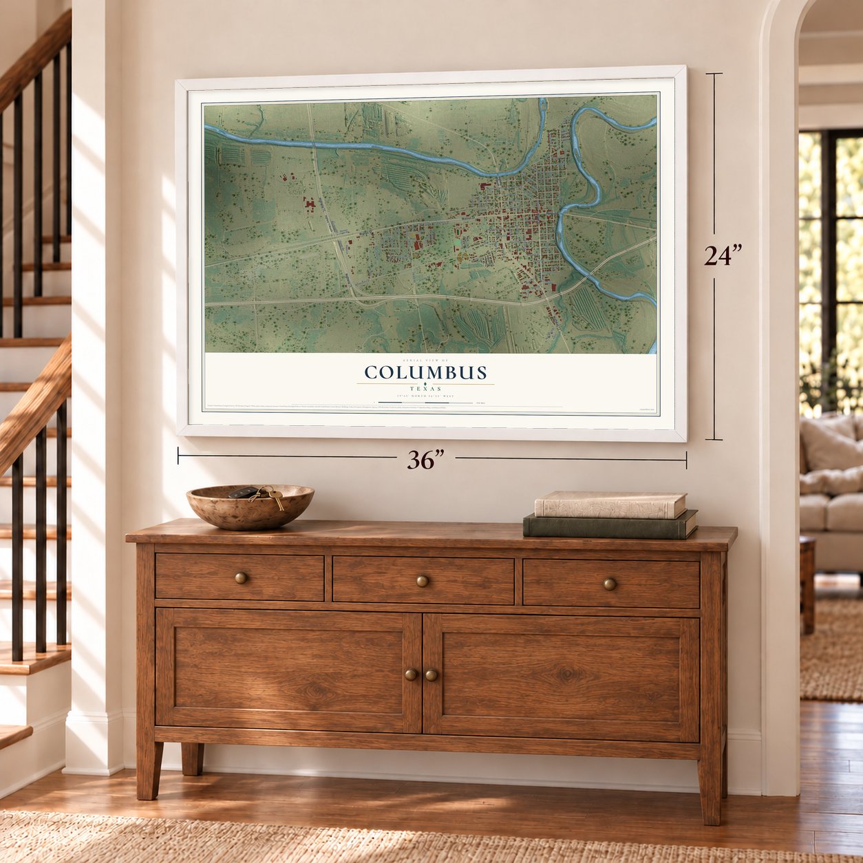 Columbus, Texas map, 24 x 36 inch print in a white frame above a dresser by a staircase